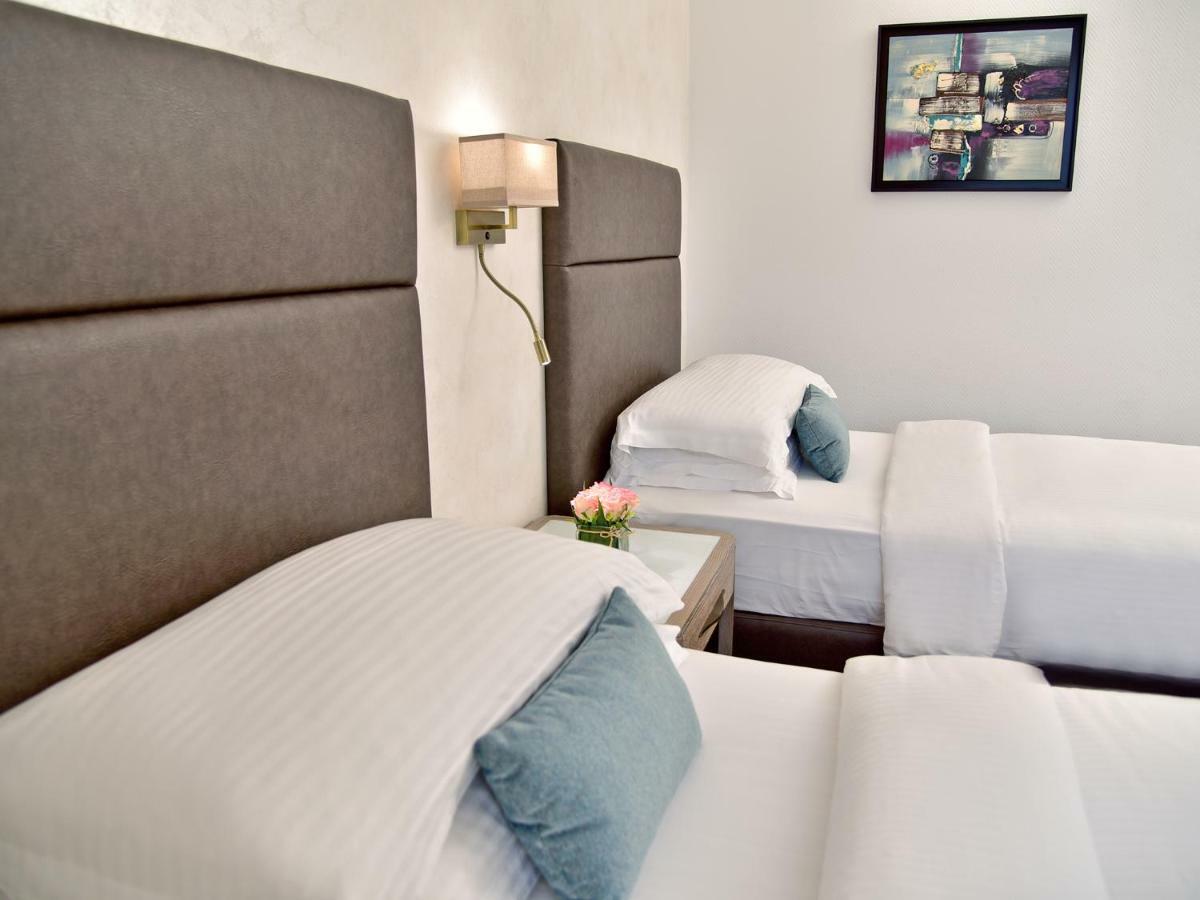 Отель Gefinor Rotana - Бейрут Экстерьер фото Deluxe Room